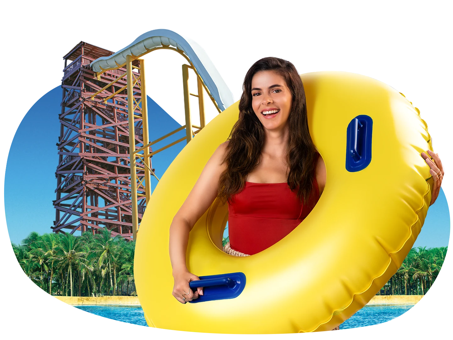 Visitante numa boia no Aqua Park do Beach Park, com o toboágua Surreal e coqueiros ao fundo